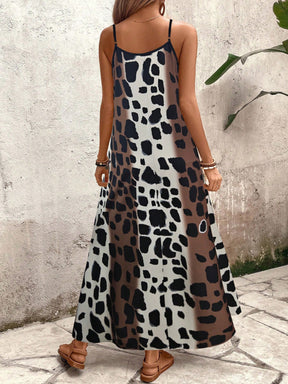 Vestido Zanzibar Menta Chic longo estampado de alças finas, modelagem ampla e tecido leve, ideal para looks casuais de verão.